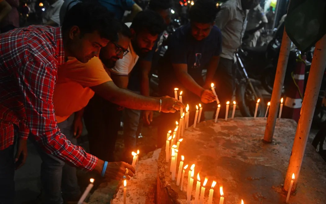 Candles, portraits and tears: Ahmedabad plane crash victims' kin pay tributes near catastrophe site