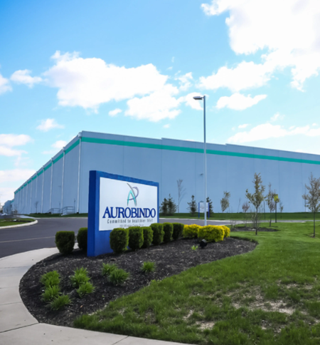 USFDA issues warning letter to Aurobindo Pharma's Telangana facility; stock dips 2 pc