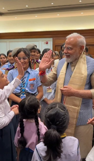 'Hi5, smiles and more': PM Modi celebrates Raksha Bandhan with schoolchildren